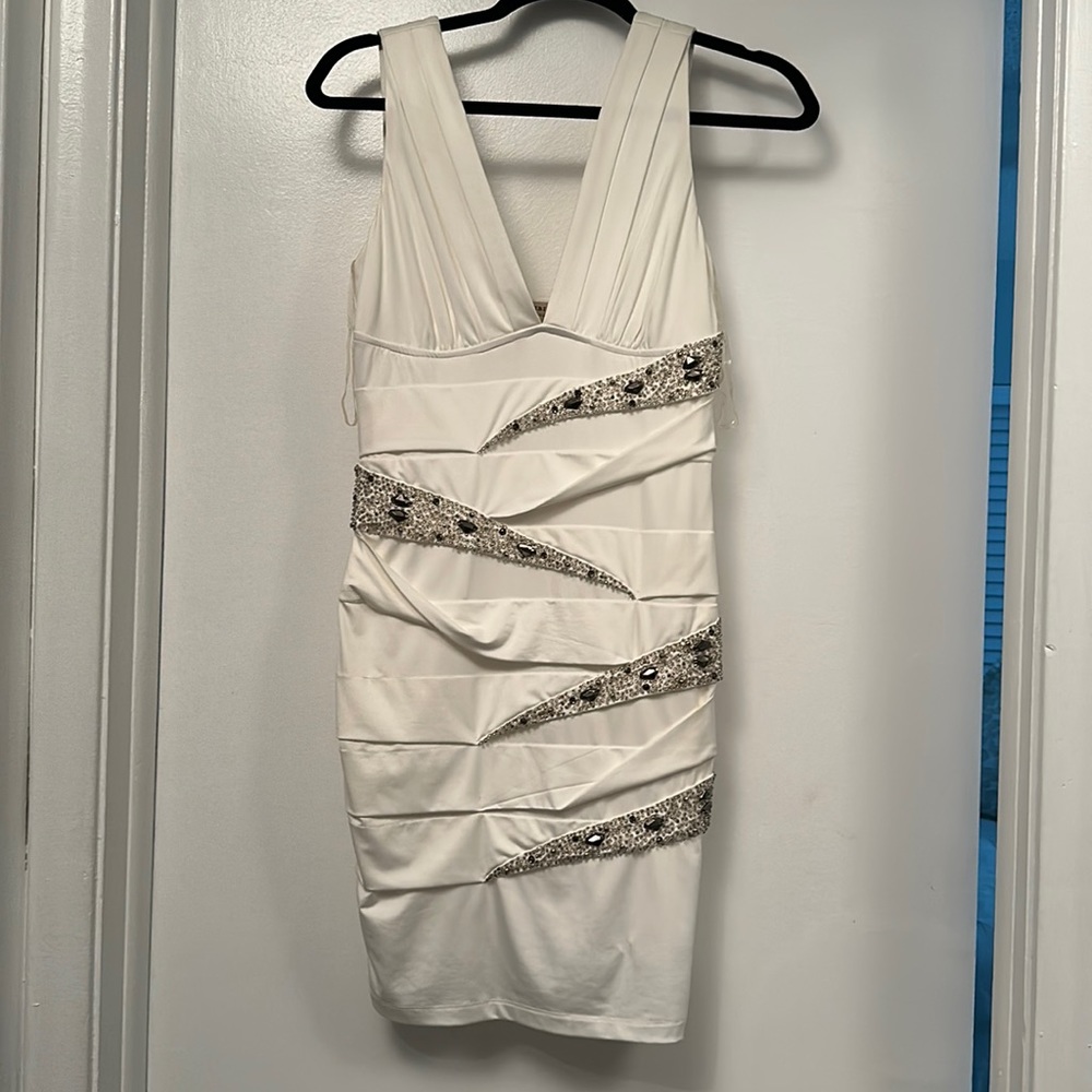 White satin dress with rhinestones..